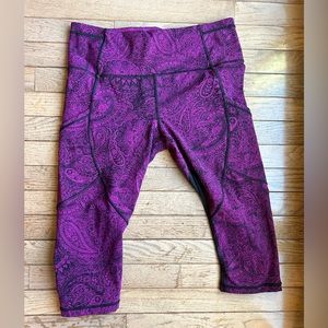 Rare Lululemon Outrun 17" Crop in Pink/Purple paisley. Excellent condition.